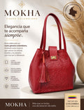 Bolso de cuero grande rojo con grabado floral, broche dorado y borla